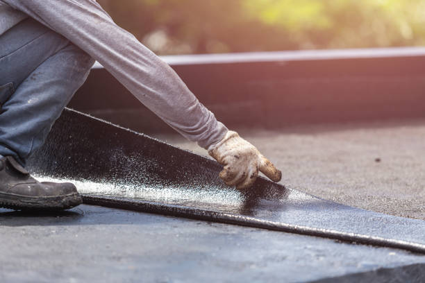 Professional Basement Waterproofing technician working in Metuchen, NJ